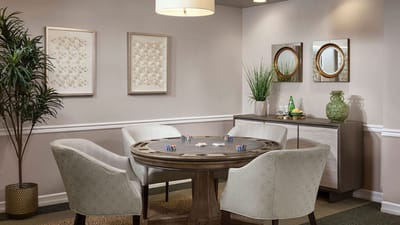 An interior common area with a poker table