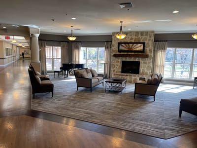 Cozy common area with seating and large windows