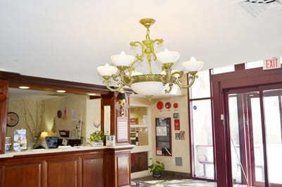 Chandelier in a welcoming facility lobby