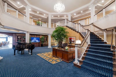 Interior view of a grand entrance with staircase