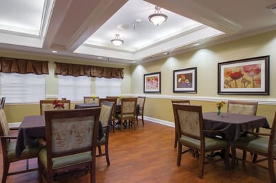Dining area with tables and floral decor