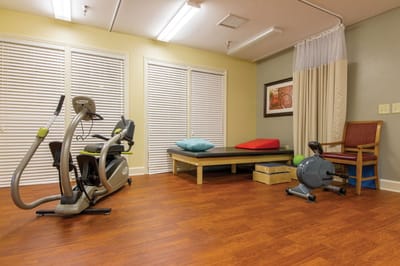 Interior view of a fitness area with exercise equipment