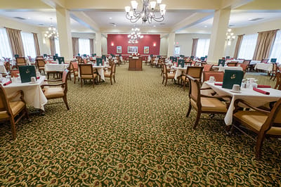 Dining room with tables set for service