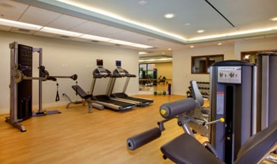 Modern fitness room with exercise equipment