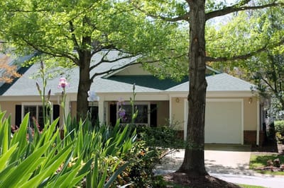 Exterior view of a residential building with landscaping