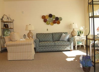 Cozy common area with a sofa and decorative accents
