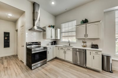 Modern kitchen interior with white cabinetry