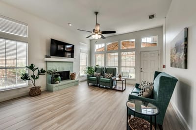 Bright common area with seating and natural light