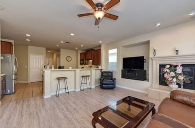 Cozy interior lounge area with seating and kitchen