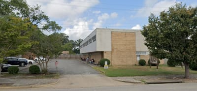 Hilton Plaza Inc., independent living in Newport News, VA — Senior living facility with outdoor seating and landscaping