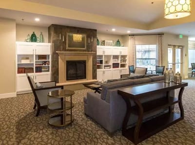 Comfortable lounge area with fireplace and seating