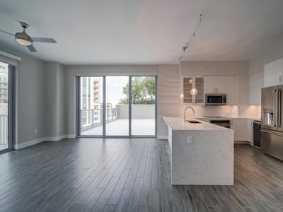 Modern interior of a spacious living area with balcony