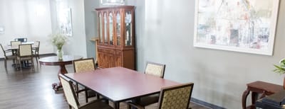 Bright common area with tables and chairs