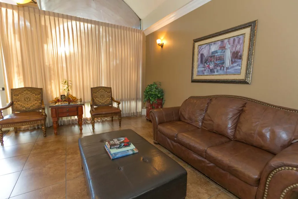 Cozy common area with seating and artwork