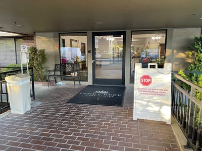 Entrance of Pine Creek Care Center with signage