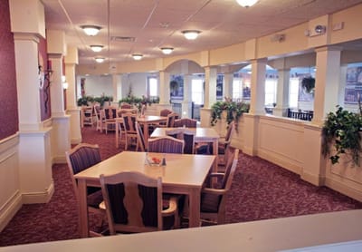 Bright dining room with tables and chairs