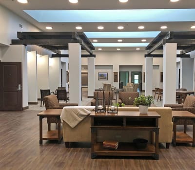 Bright common area with seating and decor