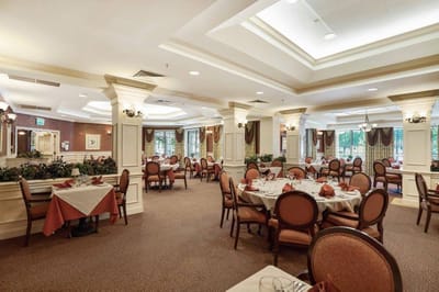 Elegant dining room with round tables and decor