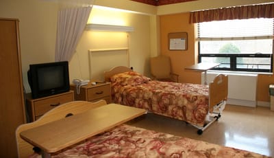 Bright, shared resident room with two beds