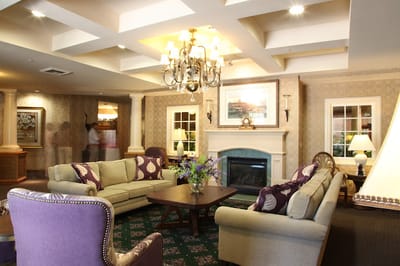 Cozy common area with seating and fireplace