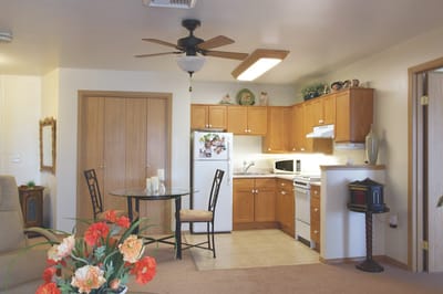 Cozy interior of a resident room with kitchen area