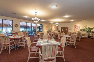 Dining area with tables set for meals
