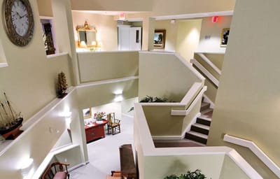 Interior view of a facility's staircase and common area
