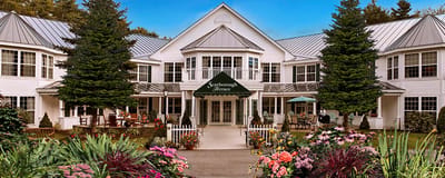 Exterior view of Scarborough Terrace with colorful flowers