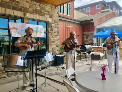 Musicians performing outdoors at a community event