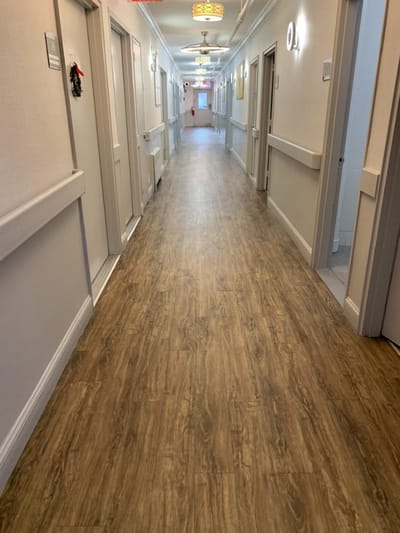 A clean hallway in a senior living facility