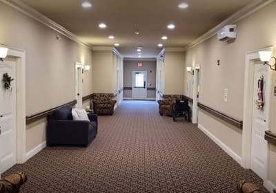 Interior hallway with comfortable seating and natural light