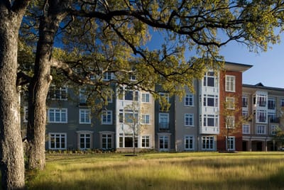 Exterior view of the facility surrounded by trees