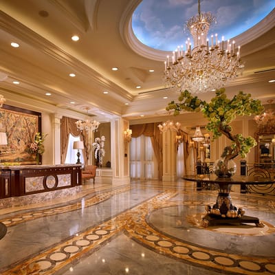 Luxurious lobby area with chandelier and elegant decor