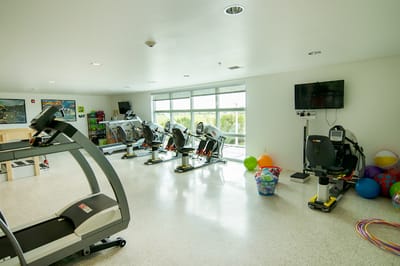 Interior view of a fitness room with equipment