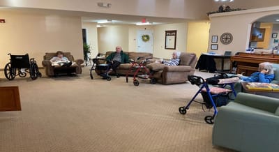 Residents sitting comfortably in a common area
