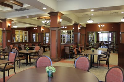 Interior view of a common area with dining tables