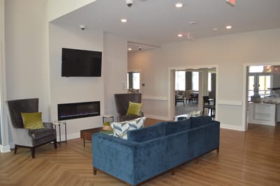 Interior common area with seating and fireplace