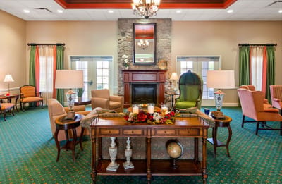 Bright activity room with comfortable seating and décor