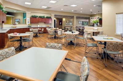 Interior dining area with tables and chairs