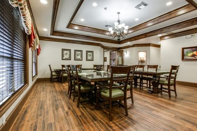 Dining room with wooden tables and chairs