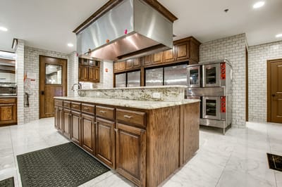 Spacious kitchen with modern appliances and fixtures