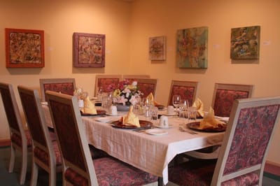 A beautifully set dining room ready for a meal