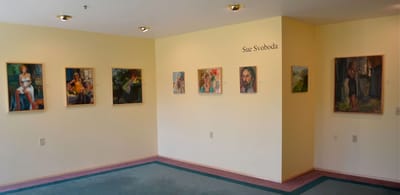Art displayed in a bright common area