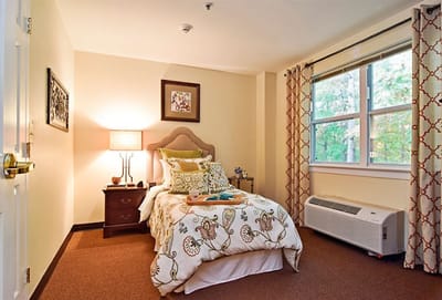 Well-furnished private resident room with natural light