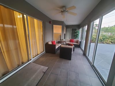 Interior lounge area with seating and windows