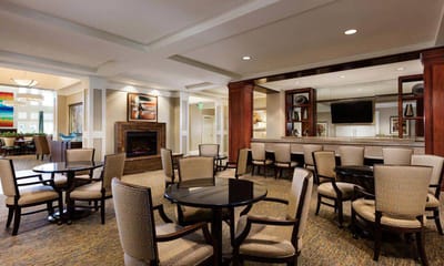 Cozy common area with chairs and tables