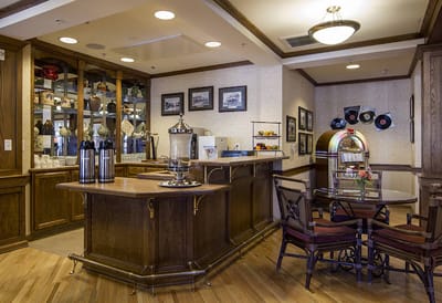 Interior view of a cozy common area with seating and decor