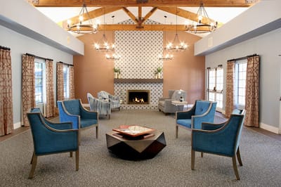 Cozy common area with seating and a fireplace
