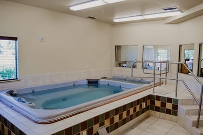 Therapy room with a hot tub.