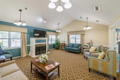 Bright common area with comfortable seating and decor